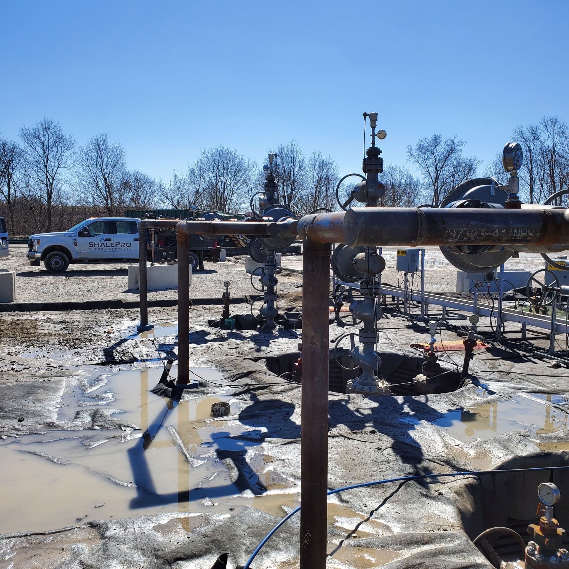 Mitigating Pipe Vibration at Compressor Exits With Helical Piles